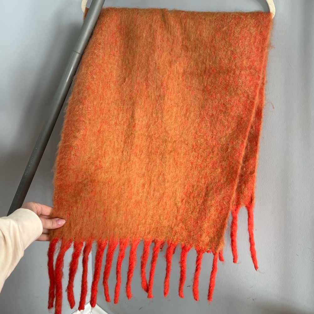 Large orange and red soft urban outfitters scarf, with orange fringe